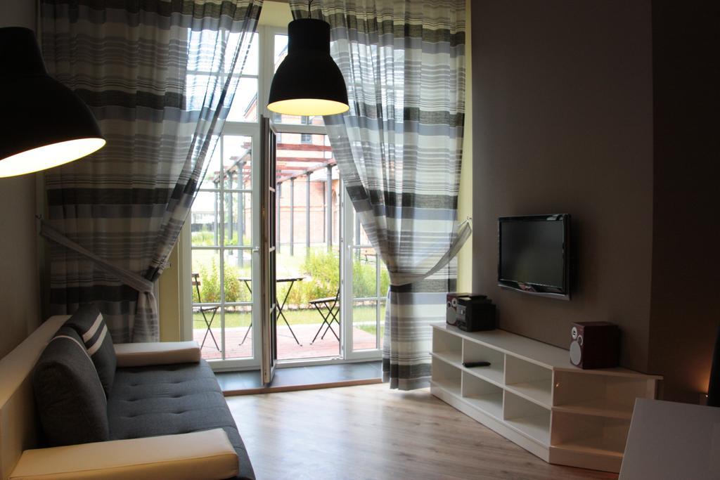 Апартаменты Loft Niezapominajka W Tobaco Park Лодзь Номер фото